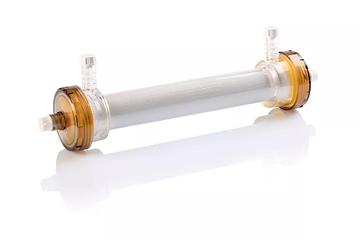 Transparent membrane filter with light brown sides used in Dialysis.